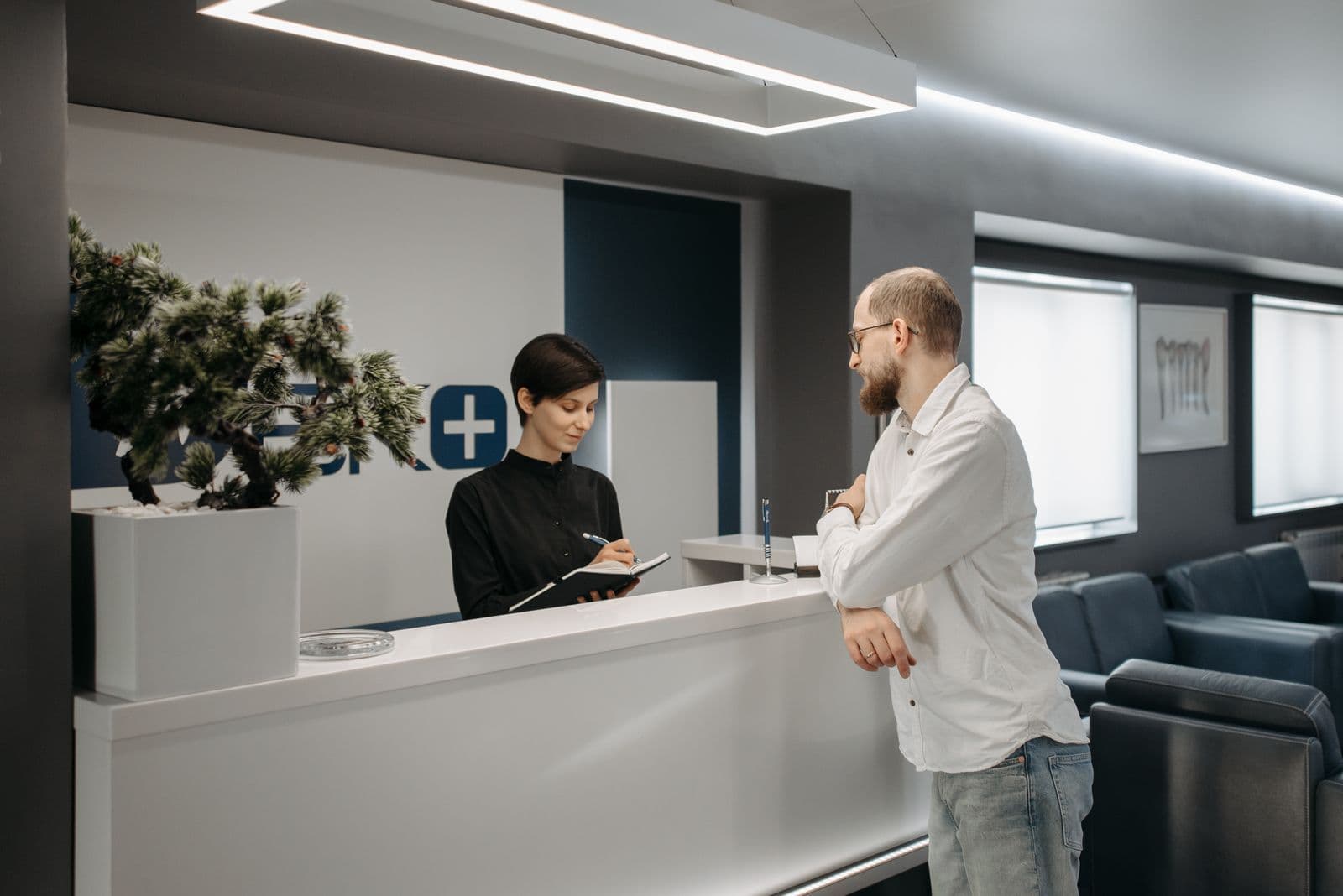 Modern, calming reception and waiting area at GlowDerm clinic